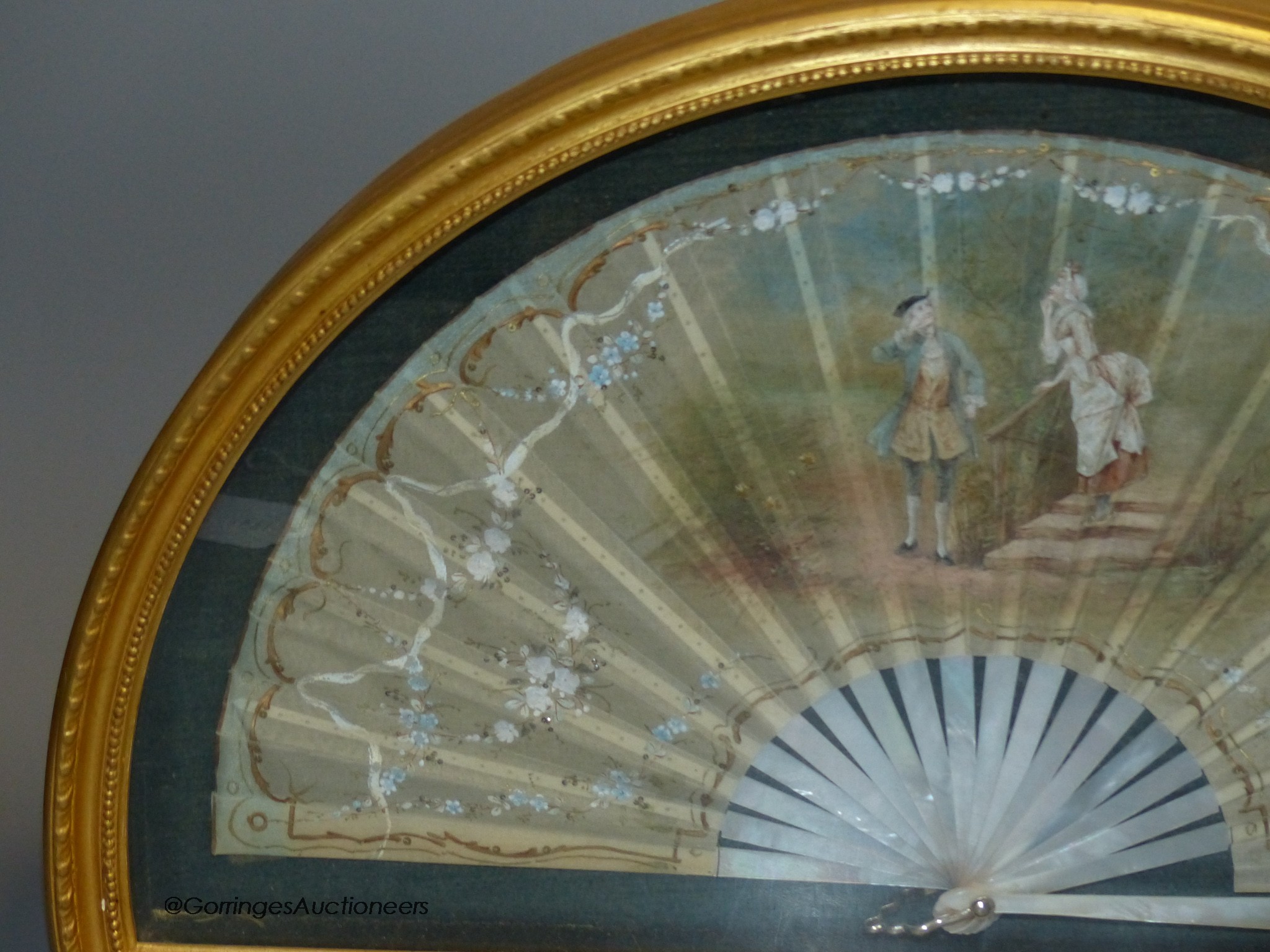 A late 19th century French painted silk fan, 39 x 20cm, cased